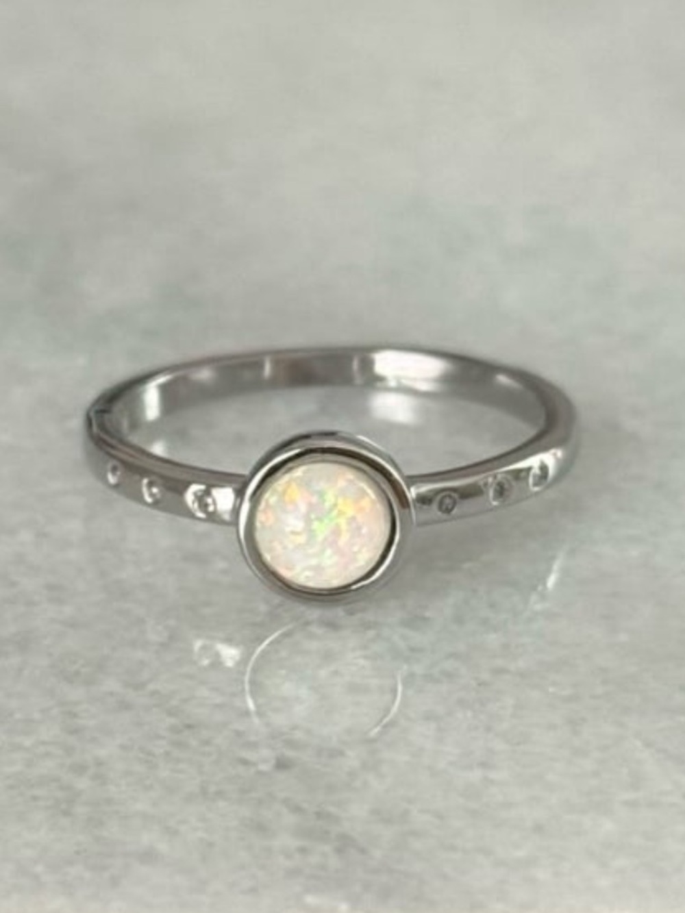 Silver Round Opal Crystal Pave Ring 

Brand New

Stainless Steel

Size 7